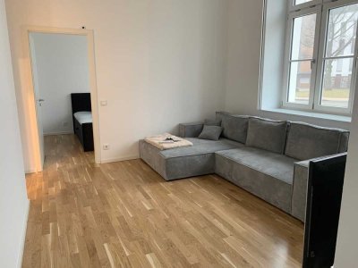 2-Zimmer Wohnung mit besonderem Charme, Einbauküche, Balkon, Tiefgaragenstellplatz