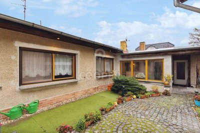 Familienfreundlicher Bungalow mit Doppelgarage und viel Nebengelass