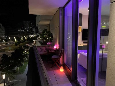 Teilmöblierte Luxus 2-Zimmerwohnung mit direktem Skyline Blick und Concierge Service im Praedium