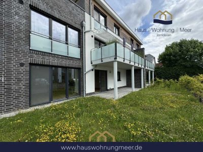 Moderne Erdgeschosswohnung in Wittmund: Neubau mit Sonniger Terrasse und Eigenem Grünbereich