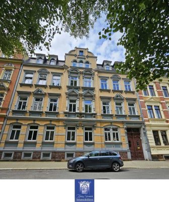 Perfekte Dachwohnung mit großem Balkon und tollen Blick in den grünen Innenhof!