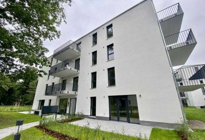 Erstbezug! 3 Zimmer mit Terrasse, Einbauküche und Stellplatz mit E-Ladefunktion