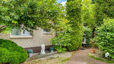 4 Zimmer Bungalow mit schönem Wohnkeller und Kamin | Ruhige Lage | Behaglicher Wintergarten