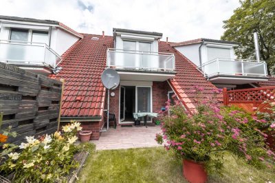 Cuxhaven-Altenwalde // Gepflegtes Reihenmittelhaus mit Garage in ruhiger Lage