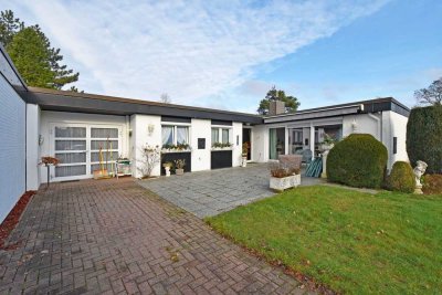 Ebenerdig Wohnen: massiv errichteter Bungalow mit 4 Zimmern auf sonnigem Grundstück mit 773 m²