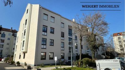 WEIGERT: Gepflegte, ruhig und doch zentral gelegene 2-Zimmer-Wohnung mit TG & Balkon in Germering