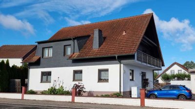 Ensemble aus sehr gepflegtem Einfamilienhaus, vermietetem 2FH, großem Grundstück, Garage & Werkstatt