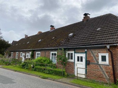 Renovierungsbedürftige Eigentumswohnung in Reihenhausform in Bülow mitten in der Natur