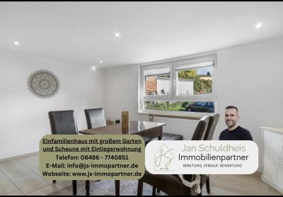 Einfamilienhaus mit großem Garten und Scheune mit Einliegerwohnung