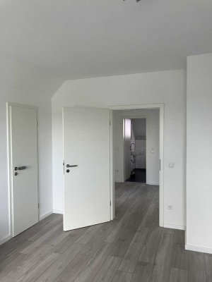 2 Zimmer DG. Wohnung in ruhiger Grünlage