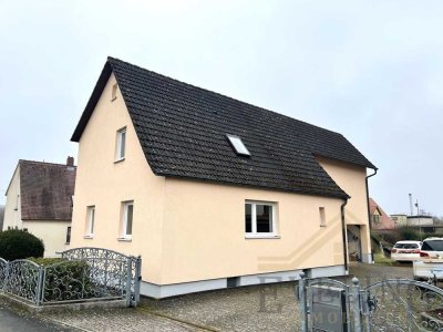 Charmantes Einfamilienhaus mit 3 Garagen und herrlichem Grundstück in Hallerndorf