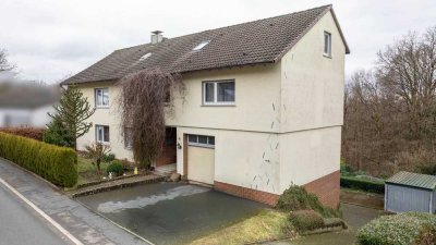 Mehrfamilienhaus mit Weitblick – Sanierungsjuwel mit Ausbaupotenzial in Top-Lage