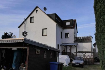 Gut gelegenes Mehrfamilienhaus mit Bauland