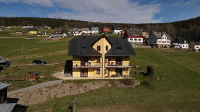 sonnige  4-Zimmer-Terrassenwohnung mit gehobener Innenausstattung mit Einbauküche in Rittersgrün