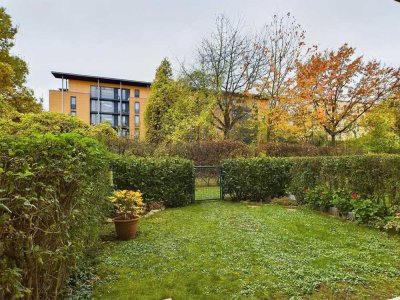 GEPFLEGTE GARTENWOHNUNG MIT SONNIGER SÜDWEST-TERRASSE UND TIEFGARAGENSTELLPLATZ