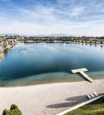 Eigentumswohnung mit süd-westseitigem Balkon, Carport, Parkplatz und eigenem Seezugang samt Liegebereich