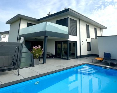 EXKLUSIVES, MODERNES & GROSSZÜGIGES EINFAMILIENHAUS MIT POOL