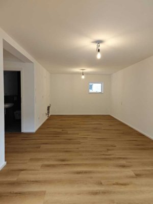 Erstbezug nach Neubau - Stilvolle 1-Zimmer-Erdgeschosswohnung