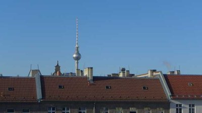 Exklusives Penthouse: Großzügige Dachterrasse und hochwertiger Küche