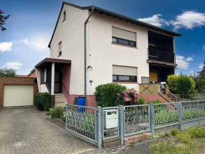 Einfamilienhaus in ruhiger Feldrandlage mit schönem Garten und Garage in Armsheim