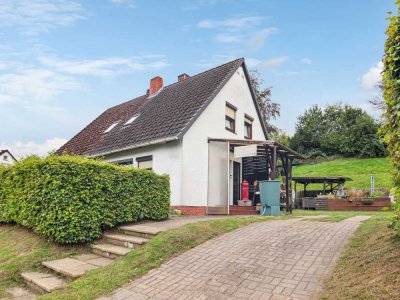 Vermietete Doppelhaushälfte mit Doppelcarport und Garage in Ritterhude