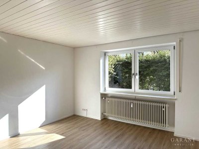 Helle, freundliche Wohnung mit kleinem Garten und Garage!