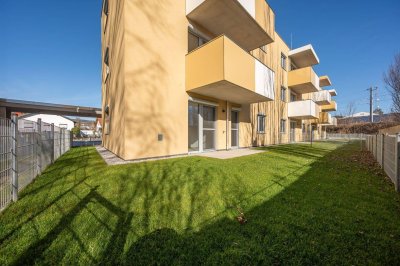 VIDEOTOUR! Eckwohnung mit schönem Eigengarten und überdachter Terrasse (3 Zimmer, inkl. 2 KFZ-Stellplätze)