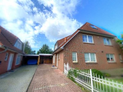 Moderne Doppelhaushälfte mit Photovoltaikanlage, Carport, Garten und weiteren erstklassigen E