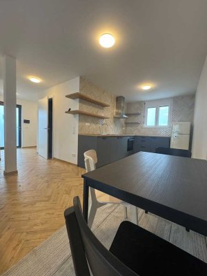 2 Zimmer, Möblierter Neubau 2024 mit Einbauküche, Stellplatz, Terrasse