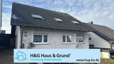 Freies großzügiges Zweifamilienhaus mit Garten und Garage in toller Hanglage von Busenbach