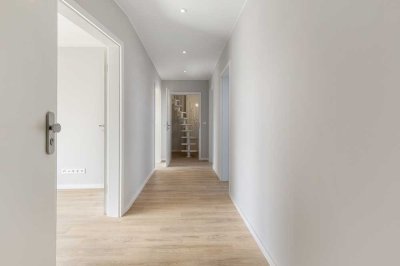 Dachgeschosswohnung mit Balkon und ausgebauten Spitzboden