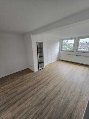 Schön renovierte Dachgeschoss-Wohnung in gesuchter Lage von Meerbusch-Büderich!