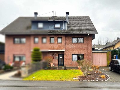 Gepflegte Doppelhaushälfte mit PV-Anlage, Terrasse, Balkon und Garage in ruhiger Wohnlage!