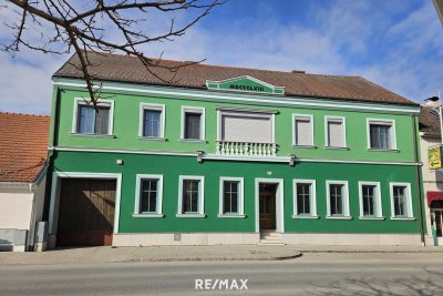 Mehrfamilienhaus mit Werkstatt und Lagerräumen