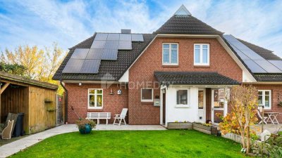 Praktische und gepflegte DHH mit Südterrasse, Kamin und Carport | Schöne Lage in Elbe-Nähe