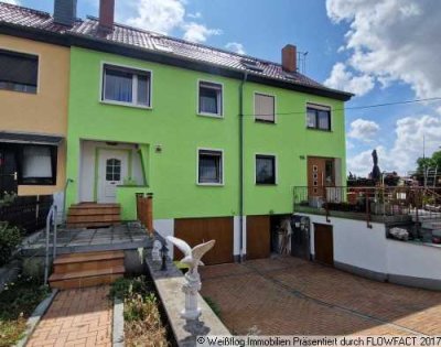 Reihenmittelhaus mit Terrasse, Garten und Garage