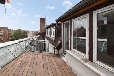 Helle zentral gelegene Dachgeschosswohnung mit Dachterrasse und Aufzug!