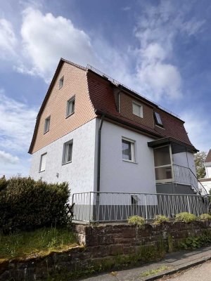 Frei stehendes Mehrfamilienhaus mit Garten und mehreren Stellplätzen in guter Lage von Stetten