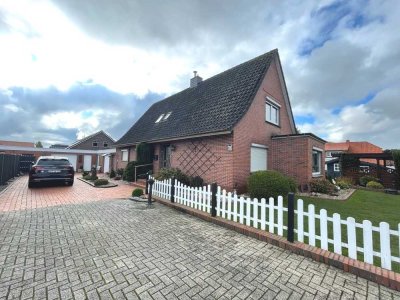 RESERVIERT - Charmantes Einfamilienhaus mit 2 Garagen und Wintergarten in Veenhusen