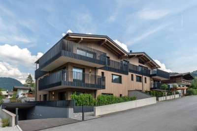 Neubauwohnung im Obergeschoss mit traumhaftem Bergblick ( 06074 )