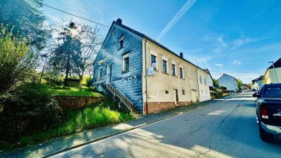 **Sanierungsobjekt mit Charme: Einfamilienhaus mit großem Garten**