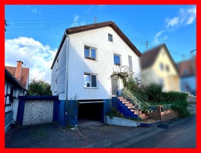 Geräumiges Familienhaus mit Terrasse, Garten und zwei Garagen