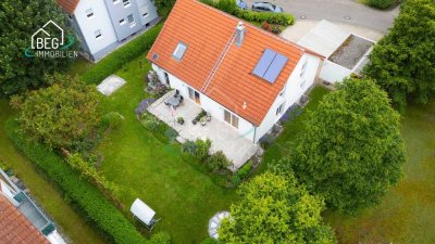 Großzügige Wohnung mit Carport 
und Garten in hervorragender Lage