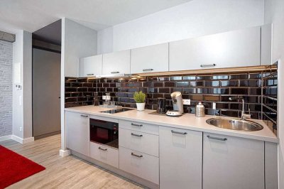 Geschmackvolle, modernisierte 2-Raum-Wohnung mit Balkon und Einbauküche in Jena