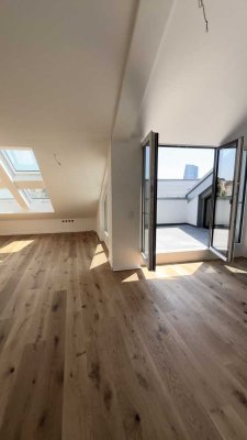 Neubau DG-Wohnung mit Dachterrasse in Toplage