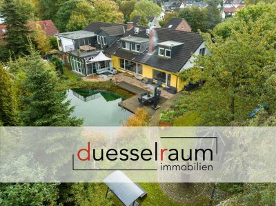 Idyllisches Wohnen in Solingen: Stilvolles Haus mit Schwimmteich und separater Einliegerwohnung!