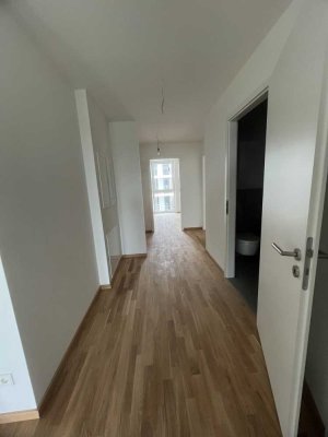 Erstbezug Neubau 6. OG, EBK+TG-Stellplatz: Stilvolle 2,5-Raum-Wohnung