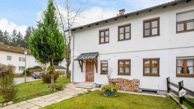 Gemütliches Reihenendhaus mit großem Garten und Potenzial für ein weiteres Wohngebäude.