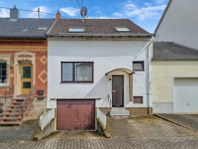 Modernisieren und profitieren: Erschwingliches Haus in guter Lage! Mit Option auf zwei Wohneinheiten