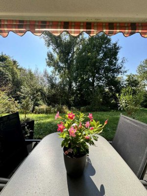 Moderne Souterrain-Terrassen-Wohnung mit viel Licht und tollem Ausblick – Stilvoll Wohnen im Grünen!